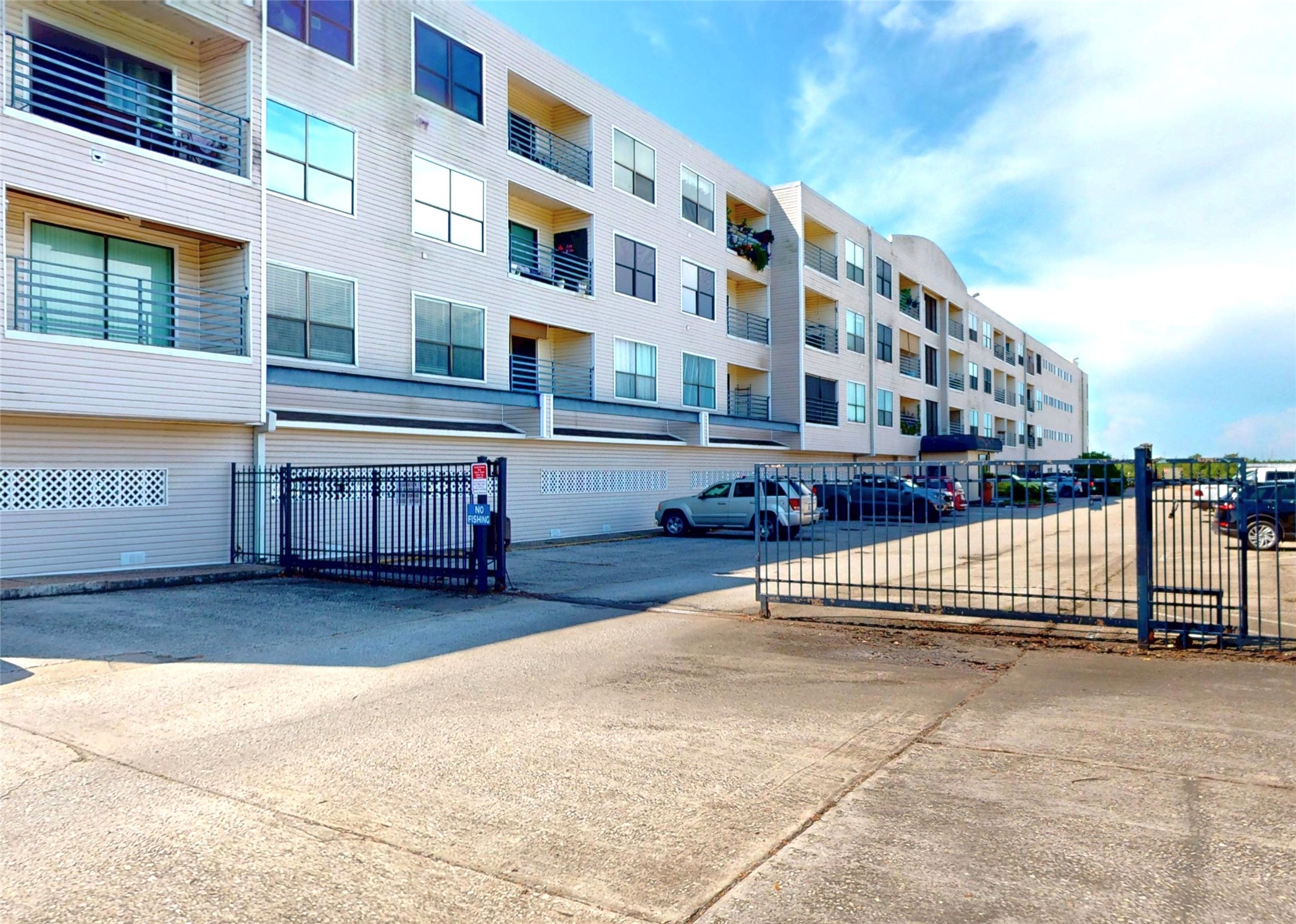 793 Davis Road, Unit 111 League City, TX 77573 - Photo 22 of 37 Controlled access entry to outdoor parking.
