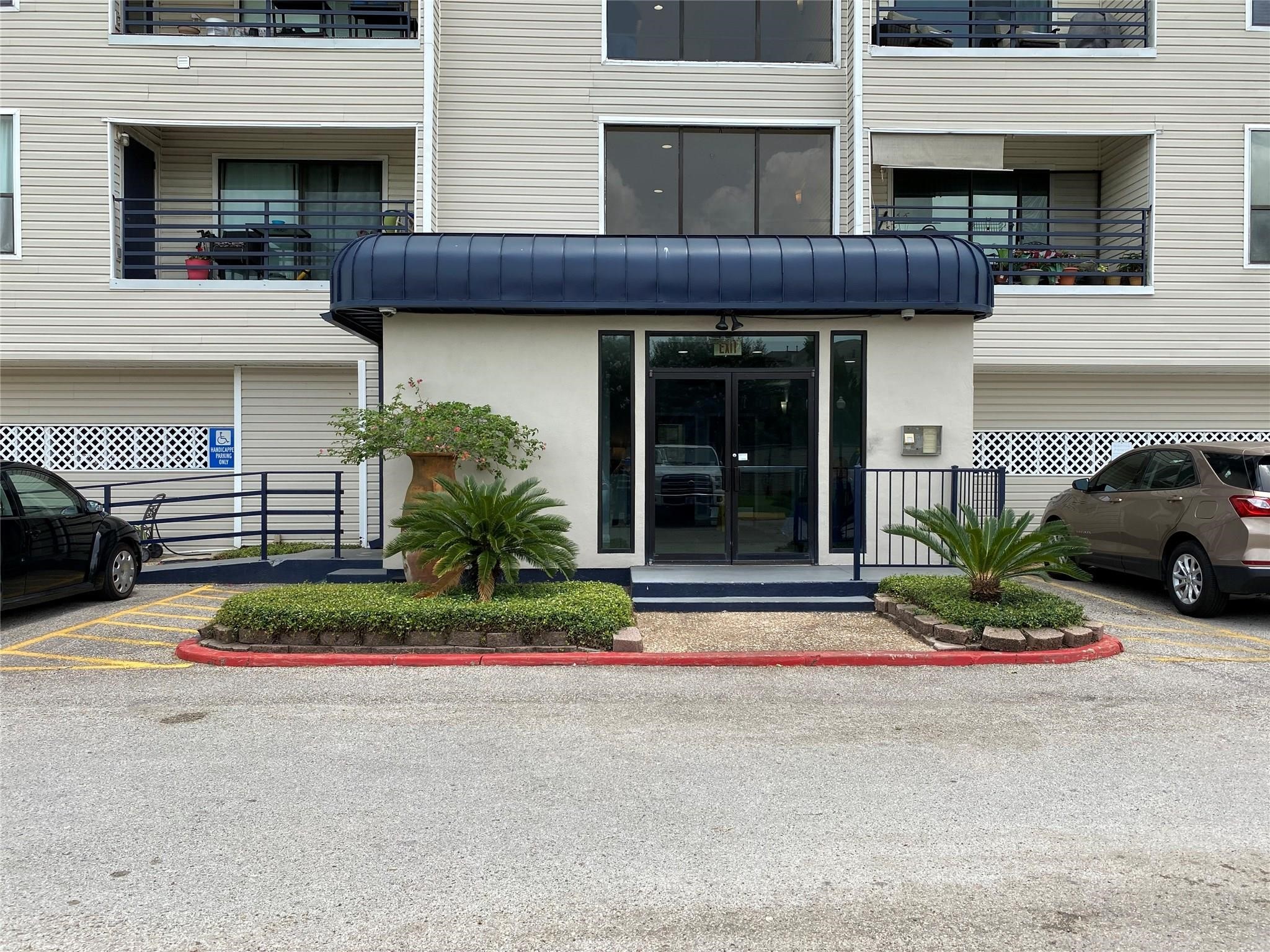 793 Davis Road, Unit 111 League City, TX 77573 - Photo 25 of 37 Awning covered, combo code controlled access to all units.