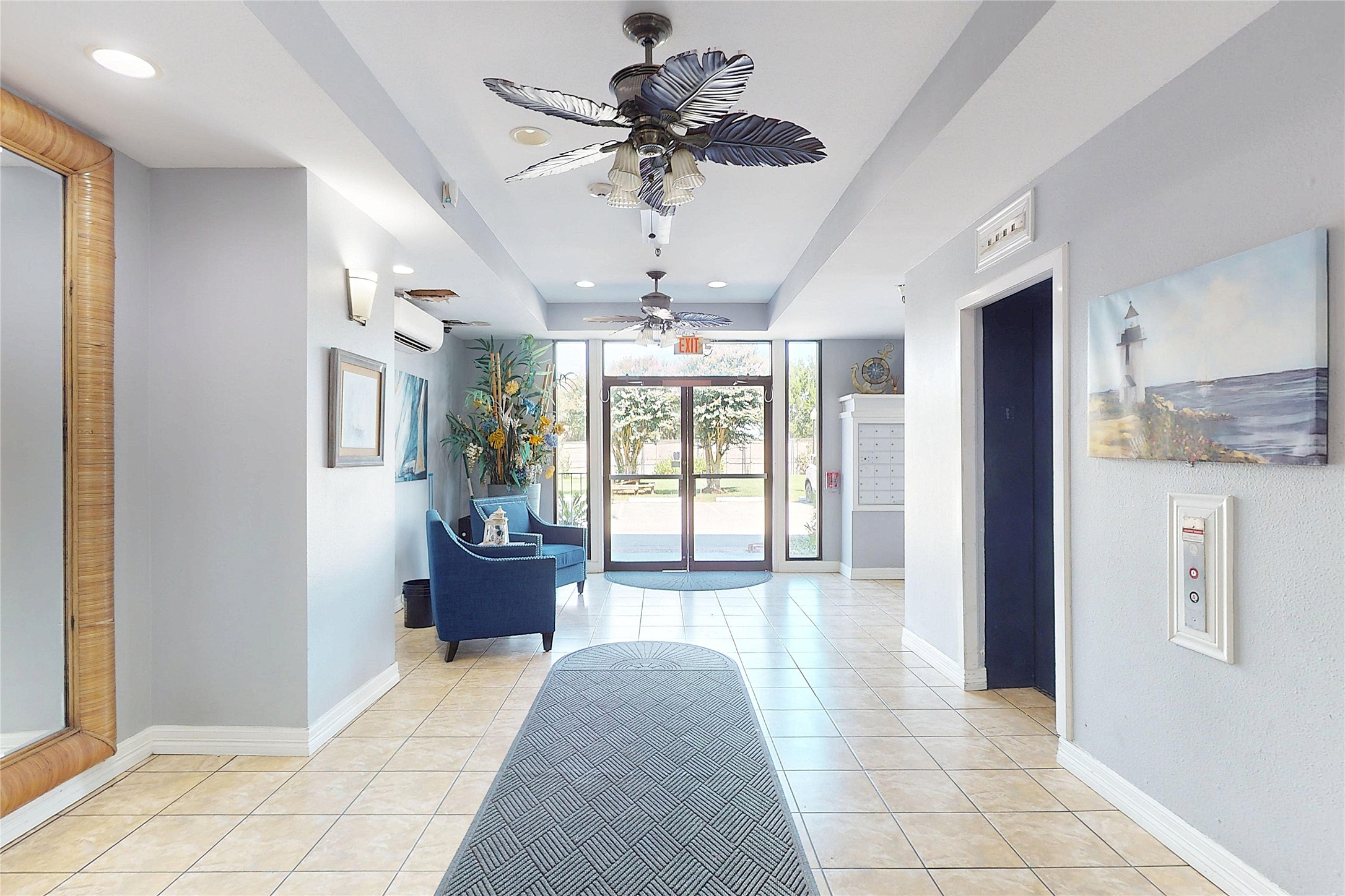 793 Davis Road, Unit 111 League City, TX 77573 - Photo 26 of 37 Elevator foyer just inside glass doors from parking lot.