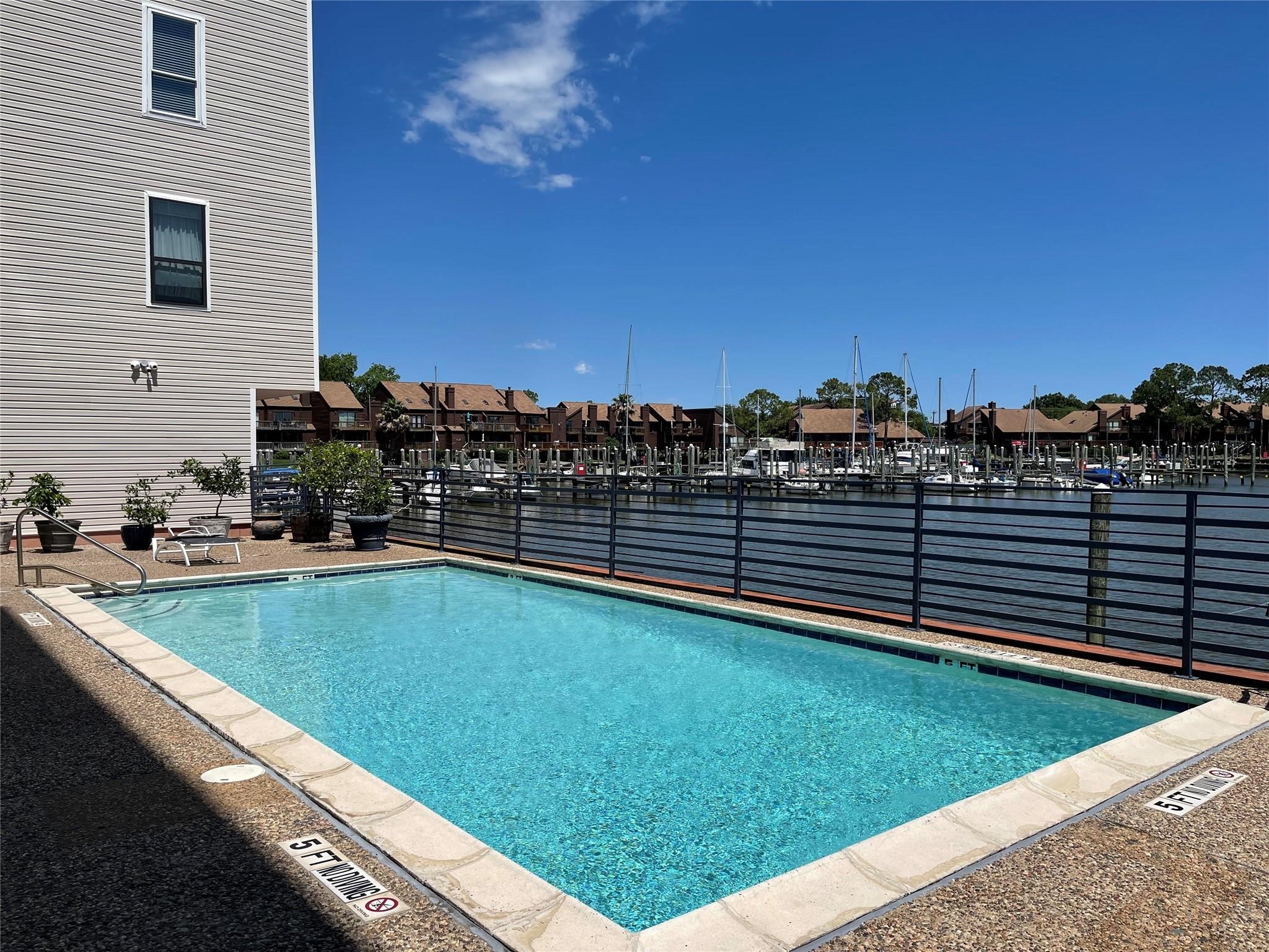 793 Davis Road, Unit 111 League City, TX 77573 - Photo 32 of 37 Pool accessible to all residents.