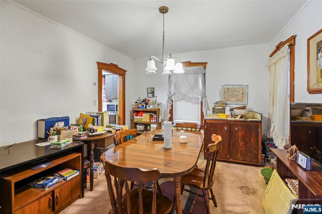 25 Ralph Street Bergenfield, NJ 07621 - Photo 6 of 17 a view of a dining room with furniture