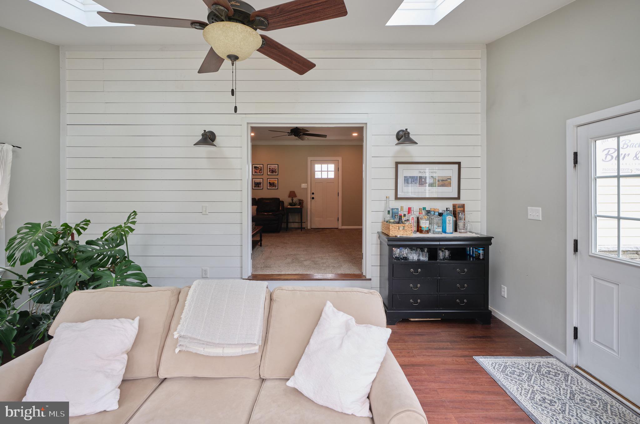 225 Chestnut Valley Drive Doylestown, PA 18901 - Photo 14 of 46 a living room with furniture and a large window