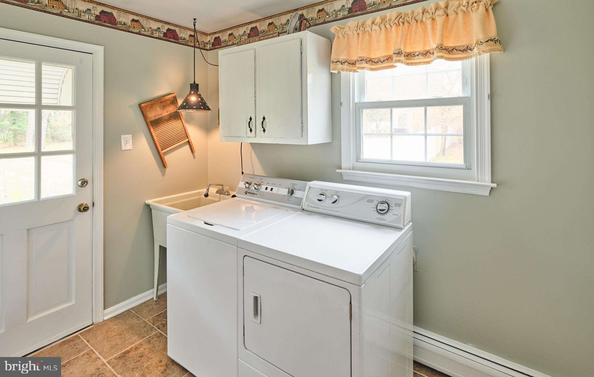 225 Chestnut Valley Drive Doylestown, PA 18901 - Photo 17 of 46 a utility room with dryer and washer