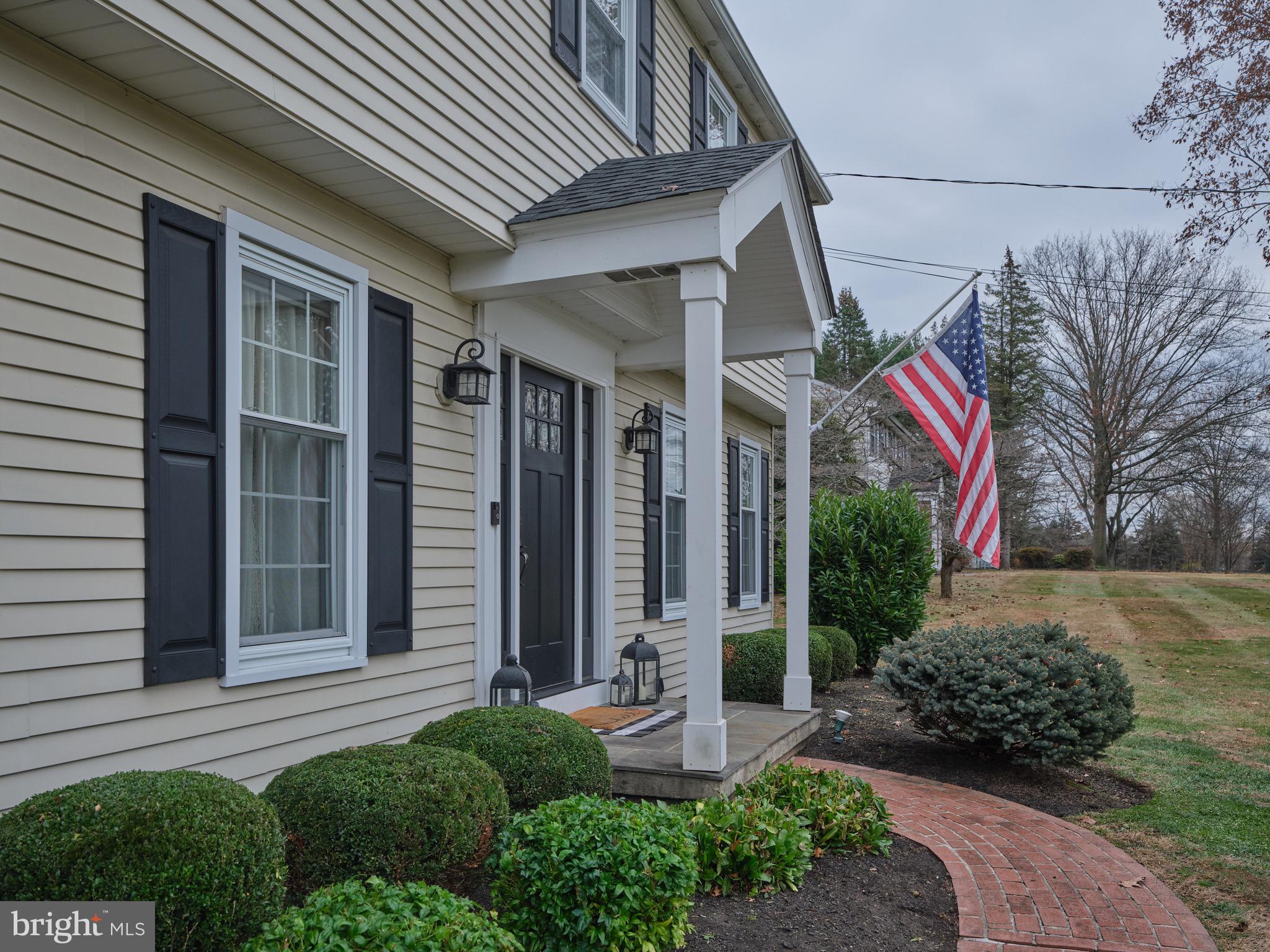 225 Chestnut Valley Drive Doylestown, PA 18901 - Photo 3 of 46 a front view of a house with garden