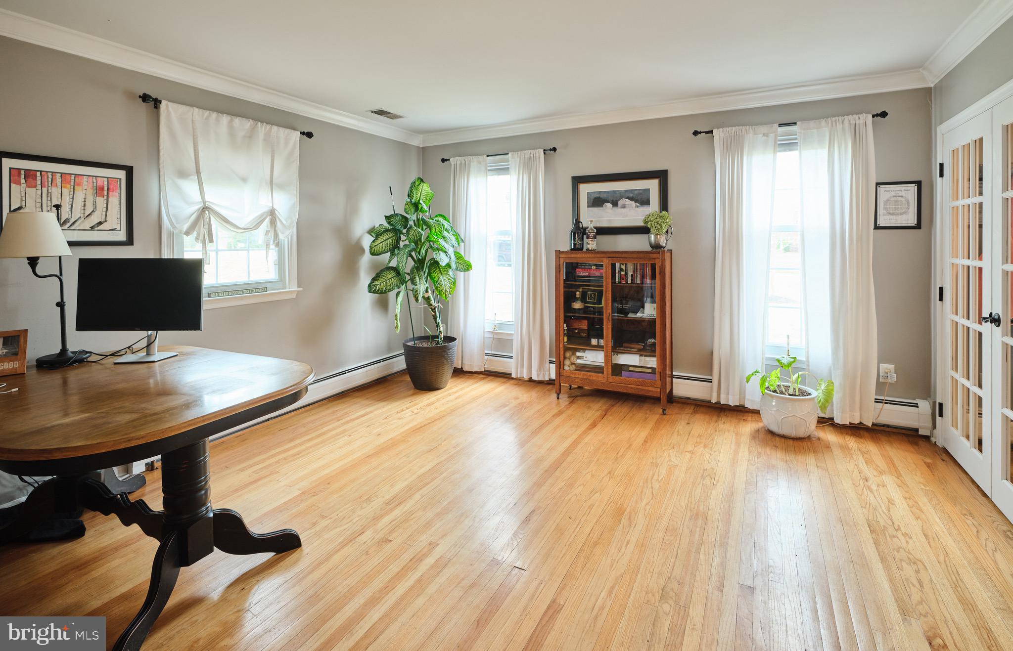 225 Chestnut Valley Drive Doylestown, PA 18901 - Photo 8 of 46 a view of a workspace with furniture and wooden floor