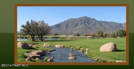 9950 North American Ranch Road Prescott, AZ 86305 - Photo 2 of 7 a view of a lake with a mountain in the background