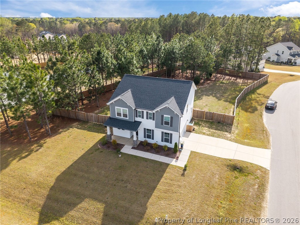 334 Beacon Hl Road Lillington, NC 27546 - Photo 46 of 49 a view of a house with a swimming pool
