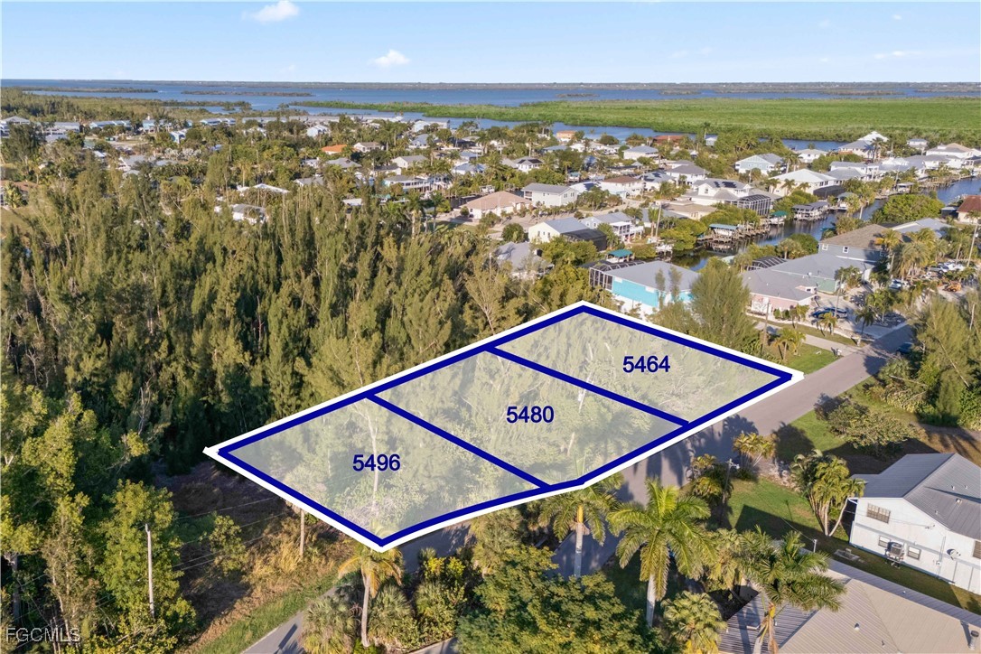 5480 Ann Arbor Drive Bokeelia, FL 33922 - Photo 3 of 12 an aerial view of a city