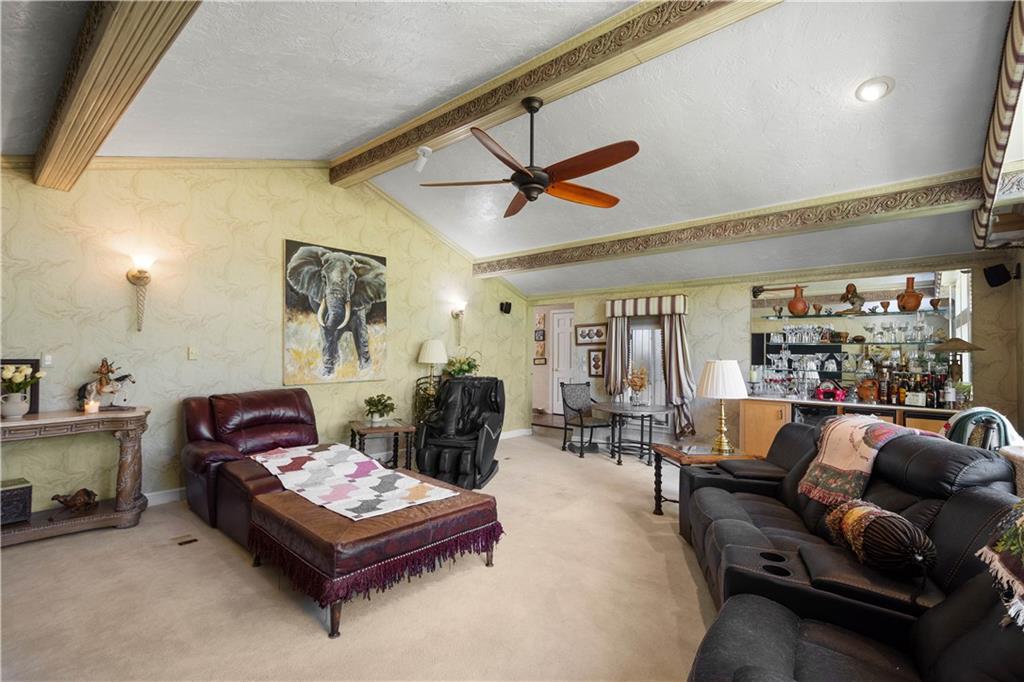 375 Wray Large Road Clairton, PA 15025 - Photo 16 of 47 a living room with furniture a ceiling fan and a rug