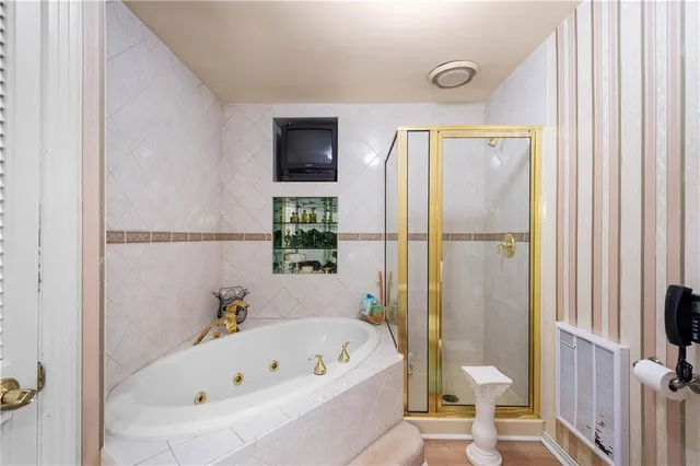 a view of a backyard with swimming pool