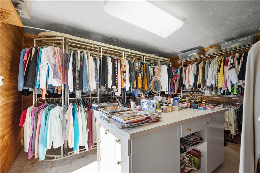 375 Wray Large Road Clairton, PA 15025 - Photo 21 of 47 a view of walk in closet with clothes and shoes