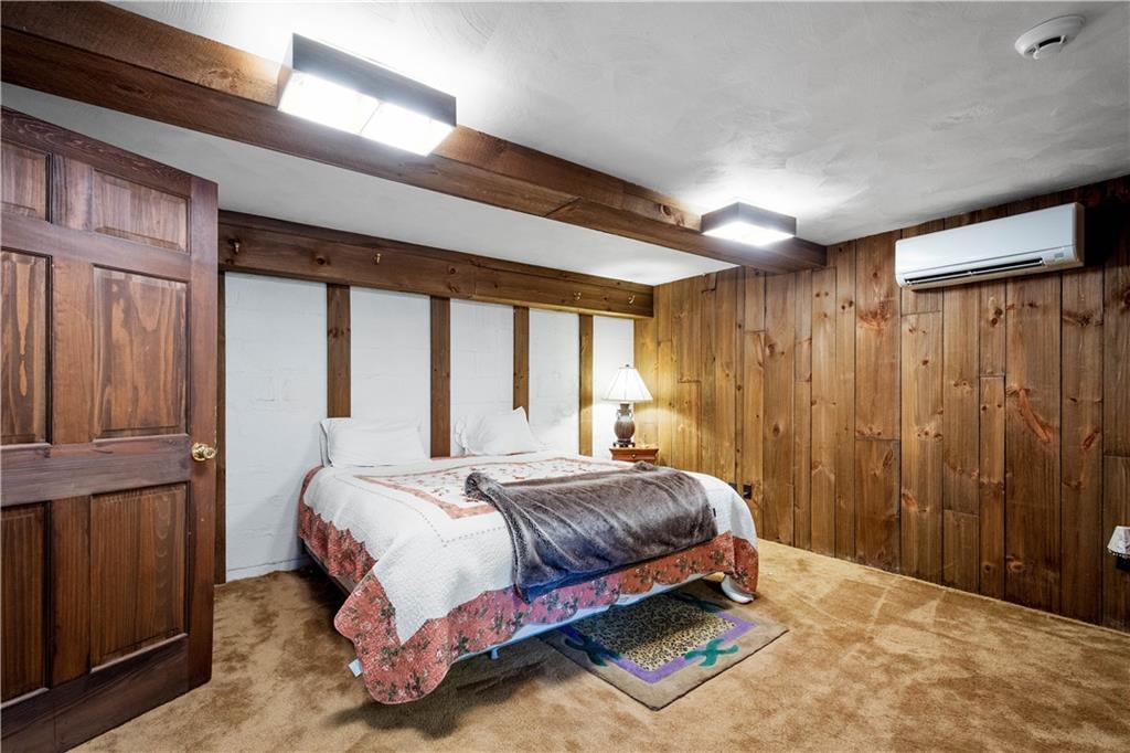 375 Wray Large Road Clairton, PA 15025 - Photo 22 of 47 a bed sitting in a bedroom next to a window