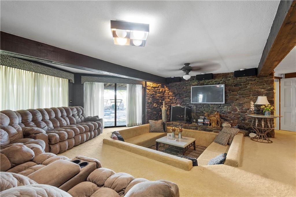 375 Wray Large Road Clairton, PA 15025 - Photo 24 of 47 a living room with furniture fireplace and a large window