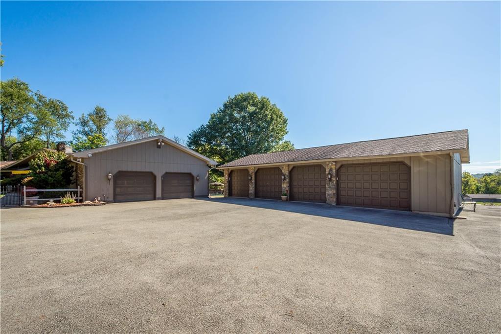 375 Wray Large Road Clairton, PA 15025 - Photo 5 of 47 a front view of a house with a yard and garage