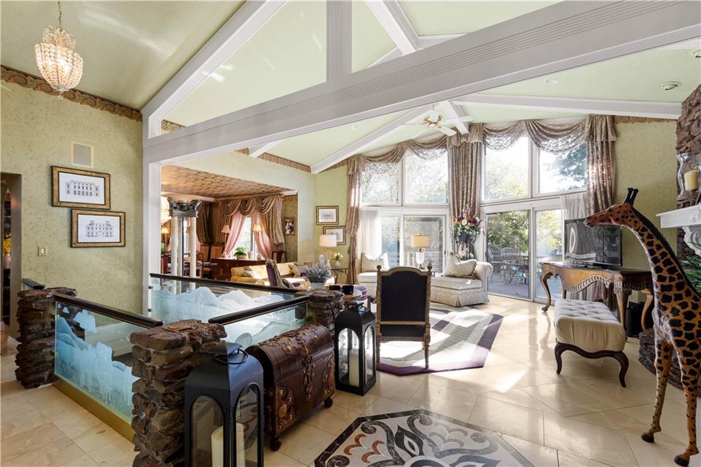 375 Wray Large Road Clairton, PA 15025 - Photo 6 of 47 a living room with fireplace furniture and a large window