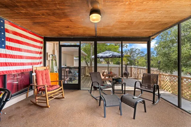 a room with lots of tables and chairs