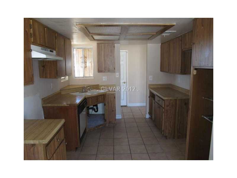 3921 Lincoln Road Las Vegas, NV 89115 - Photo 11 of 25 Kitchen. TILED FLOOR IN THE OPEN AND SUNNY KITCHEN