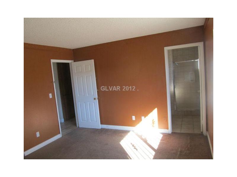 3921 Lincoln Road Las Vegas, NV 89115 - Photo 13 of 25 Master Bedroom. LARGE MASTER SUITE