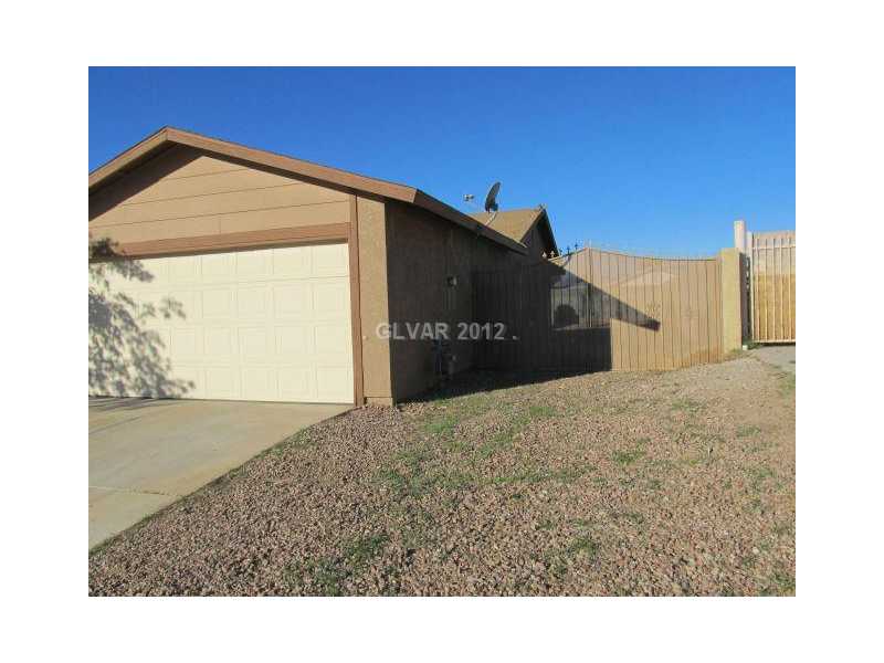 3921 Lincoln Road Las Vegas, NV 89115 - Photo 3 of 25 Property Photo. FRONT RIGHT OF HOME WITH POTENTIAL FOR RV PARKING
