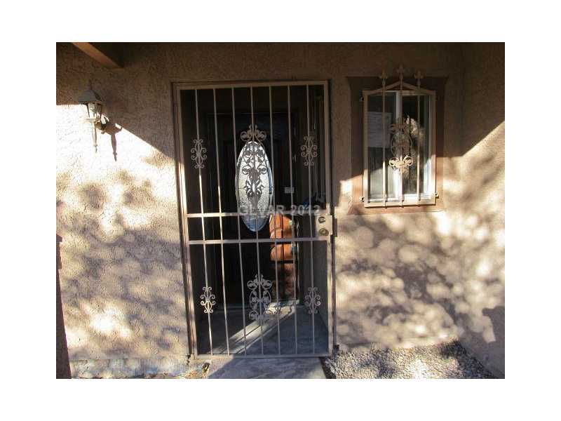 3921 Lincoln Road Las Vegas, NV 89115 - Photo 4 of 25 Property Photo. SECURITY DOOR OPENS TO THE WELCOMING ENTRY