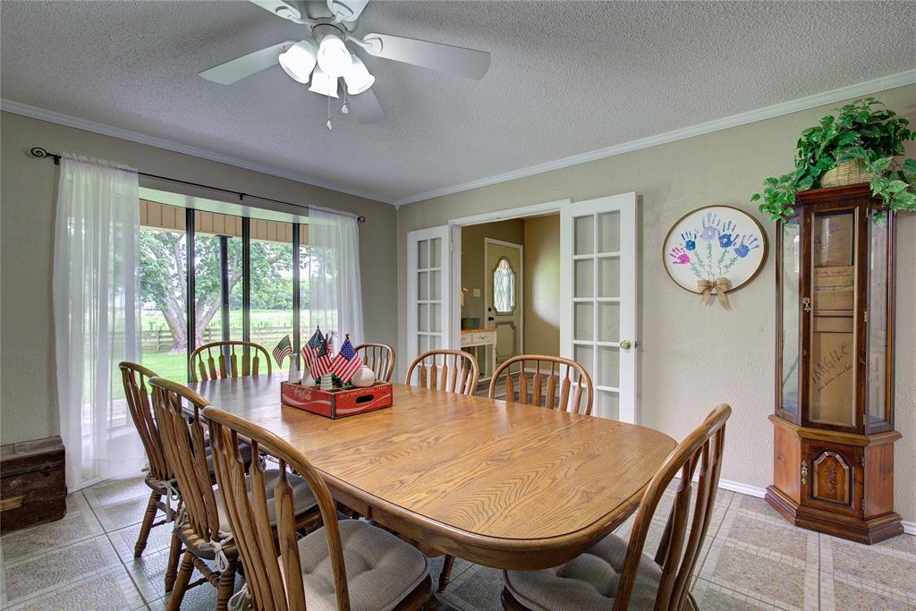 753 County Rd SW 3110 Mount Vernon, TX 75457 - Photo 7 of 40 Large formal dining has french doors from entryway, bay window.