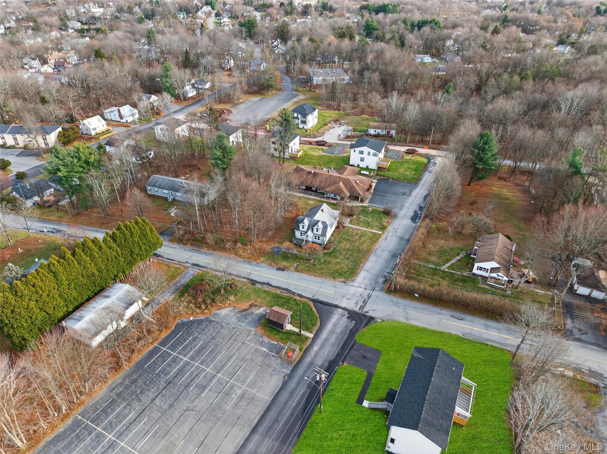 12 East Dillon Road Monticello, NY 12701 - Photo 43 of 47 an aerial view of a house a yard swimming pool and outdoor seating