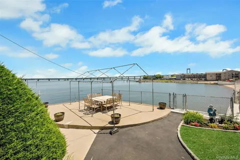 a view of a terrace with sitting area