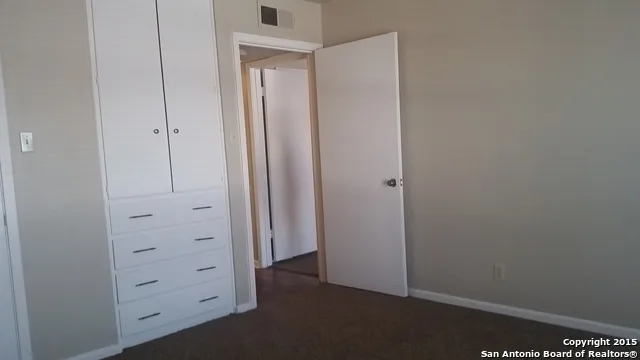 an empty room with closet