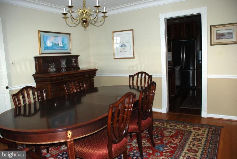 6105 Overlea Road Bethesda, MD 20816 - Photo 9 of 18 a view of a dining room with furniture