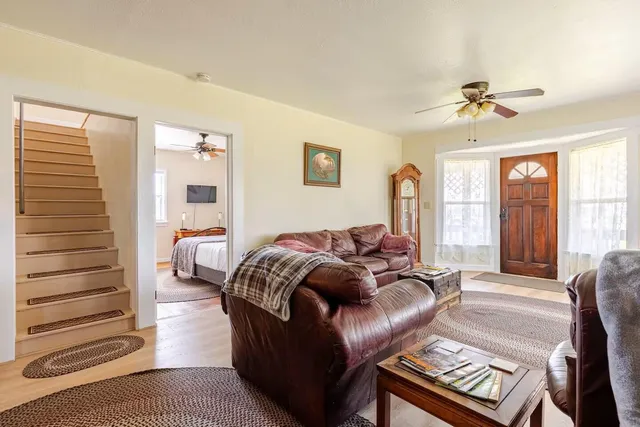 a living room with furniture and a couch