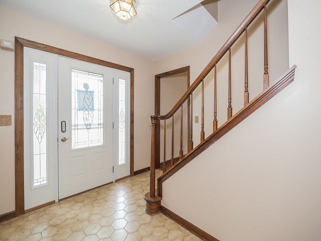 11N728 Old Barn Road Elgin, IL 60124 - Photo 5 of 25 a view of an entryway with staircase