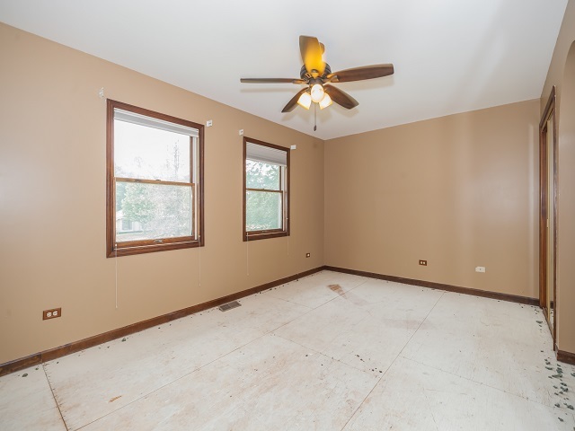 11N728 Old Barn Road Elgin, IL 60124 - Photo 7 of 25 a view of an empty room with a window