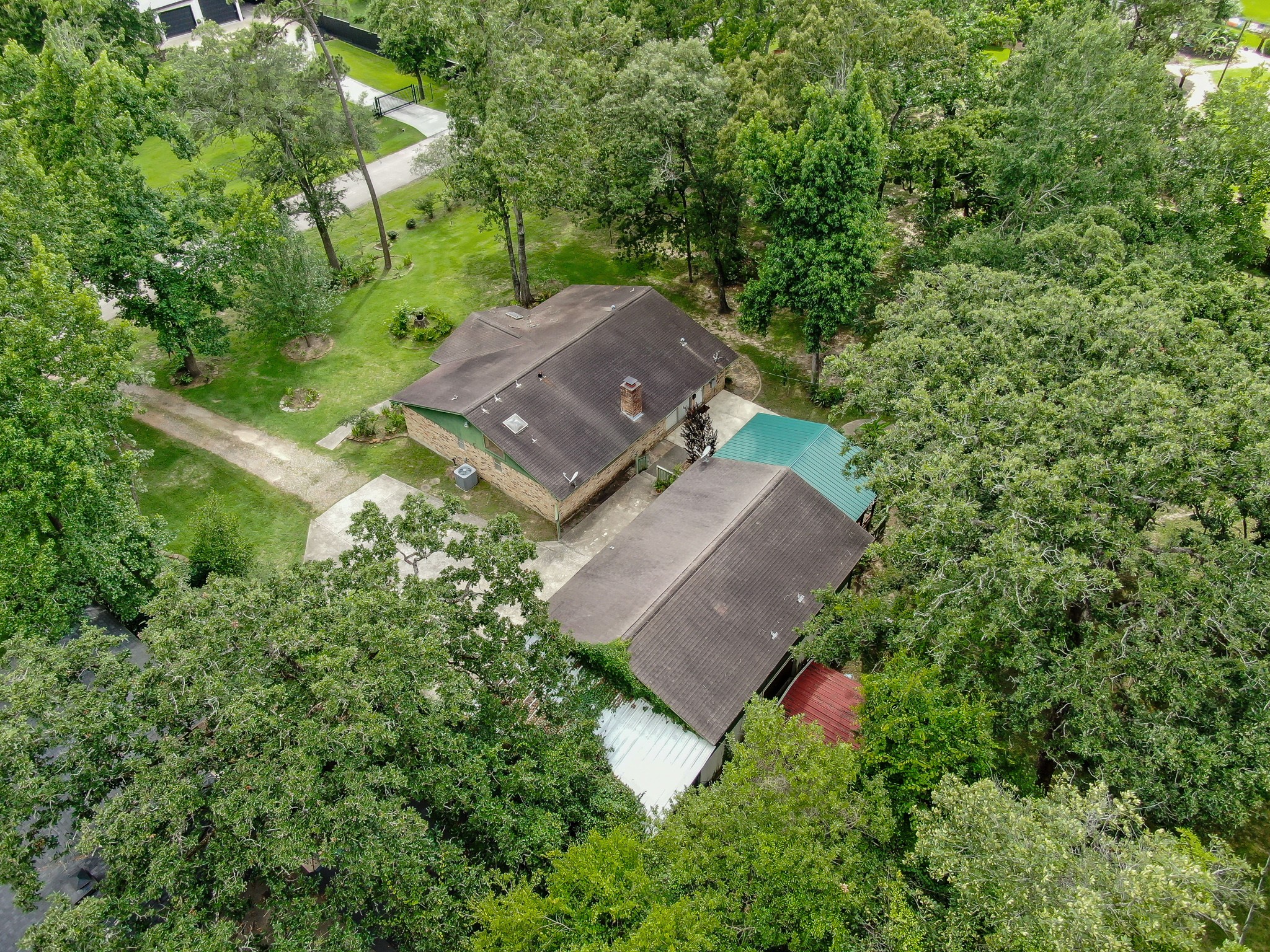 2207 Arendale Lane Spring, TX 77386 - Photo 25 of 30 Aerial view highlighting the mature, wooded 1+ acre lot.