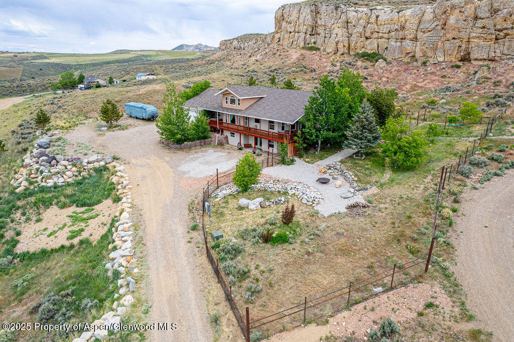 289 Lewis Lane Craig, CO 81625 - Photo 15 of 104 an aerial view of a house with a lake view