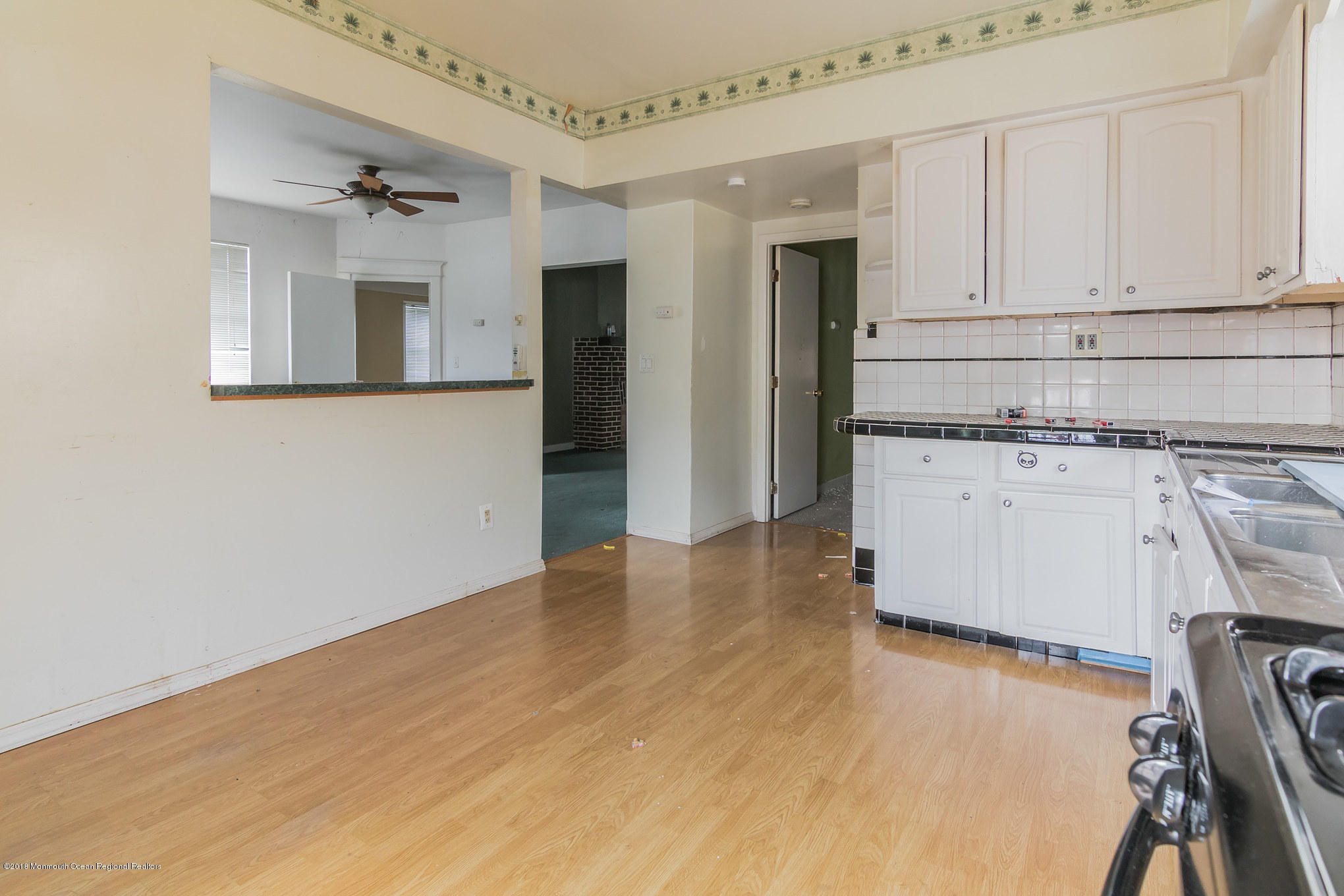 1723 River Road Belmar, NJ 07719 - Photo 15 of 29 a view of a kitchen with wooden floor