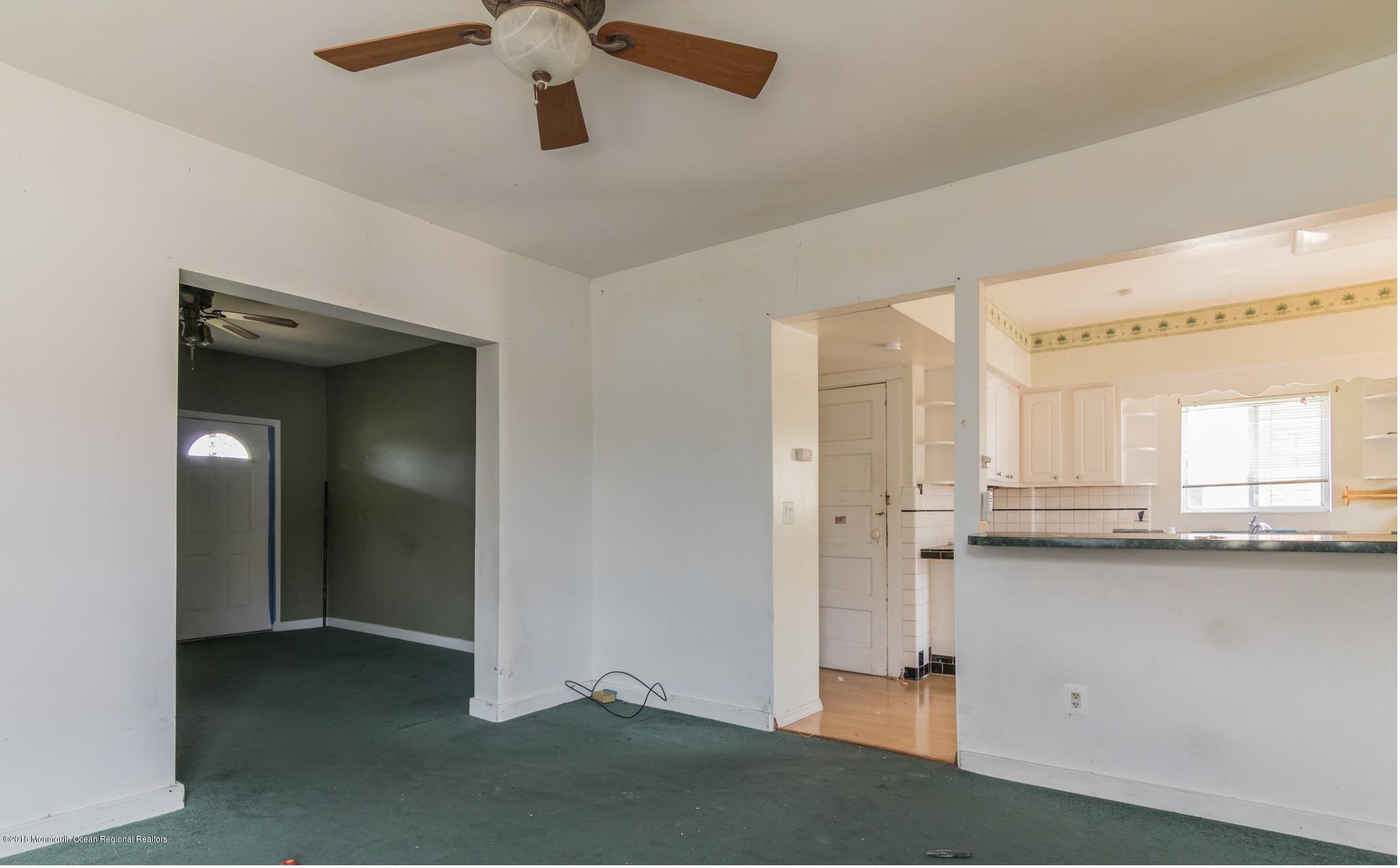 1723 River Road Belmar, NJ 07719 - Photo 18 of 29 a view of a kitchen with a sink and cabinet area