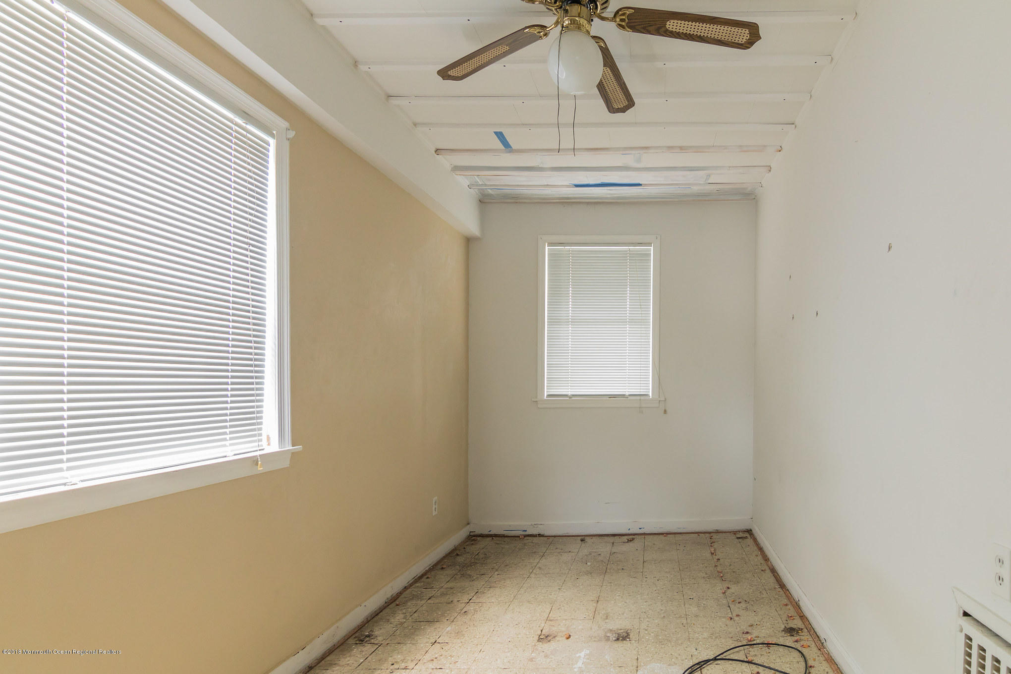 1723 River Road Belmar, NJ 07719 - Photo 19 of 29 a view of a room that has a window and cabinets