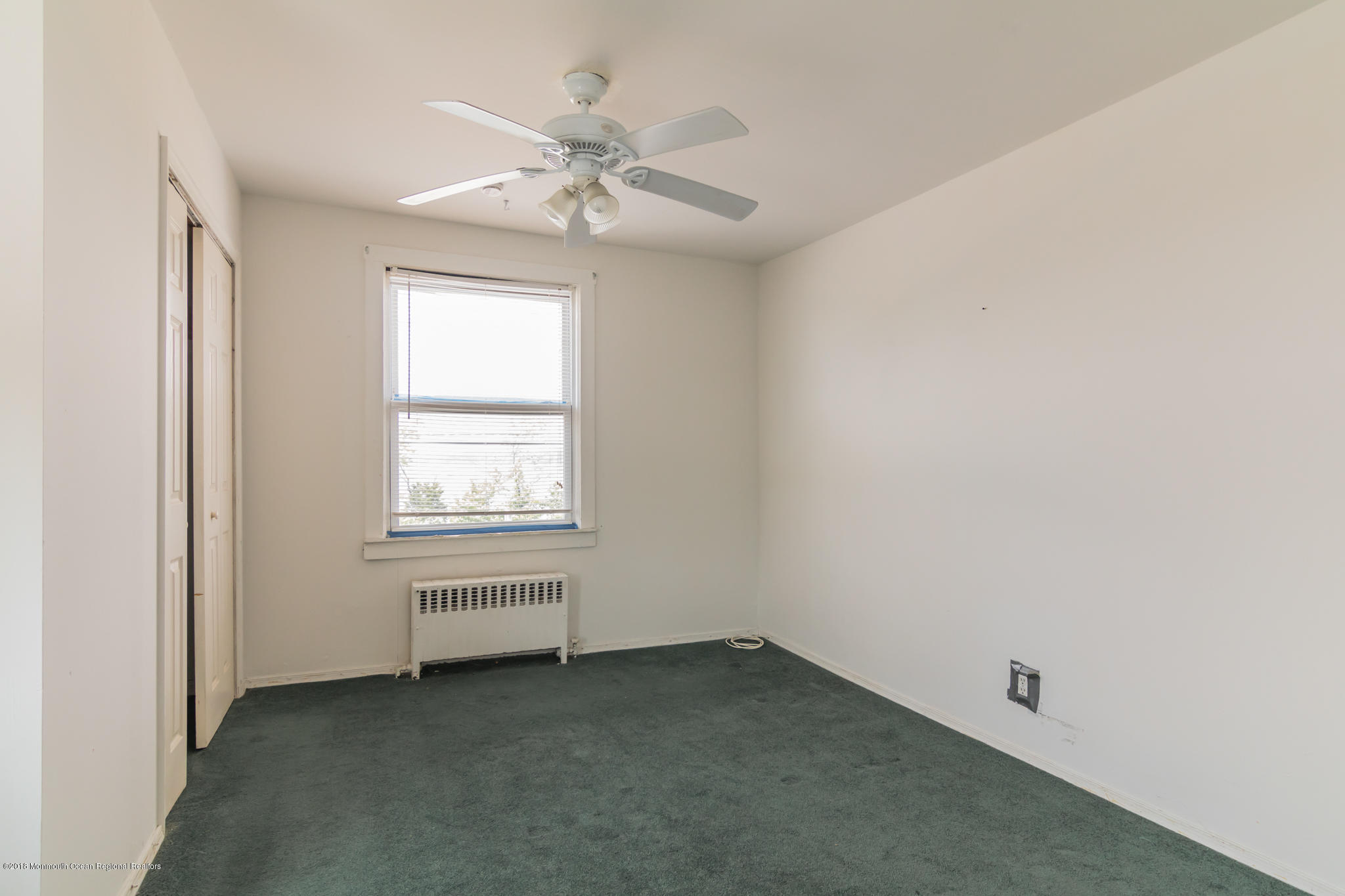1723 River Road Belmar, NJ 07719 - Photo 21 of 29 an empty room with a window