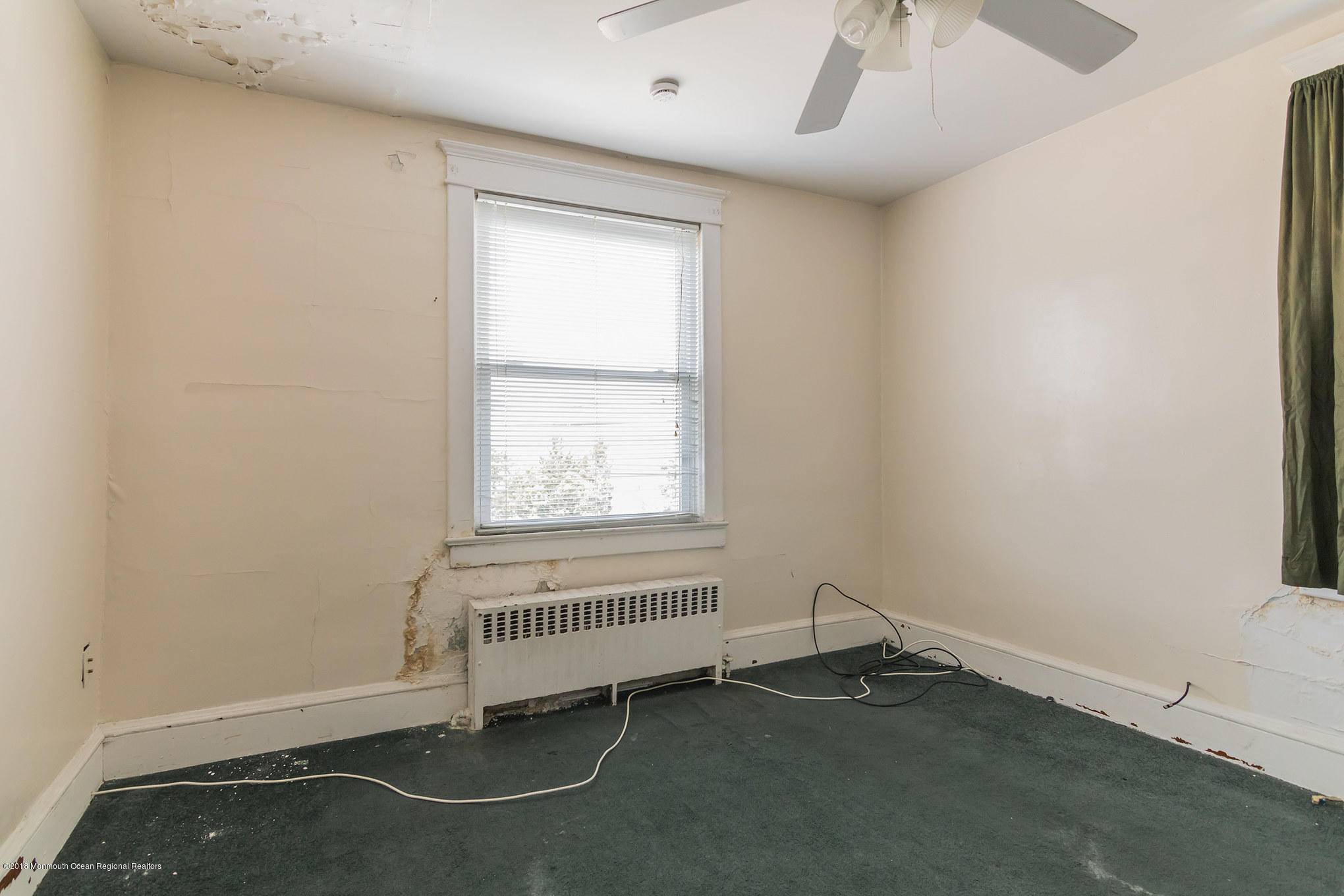 1723 River Road Belmar, NJ 07719 - Photo 23 of 29 an empty room with a window