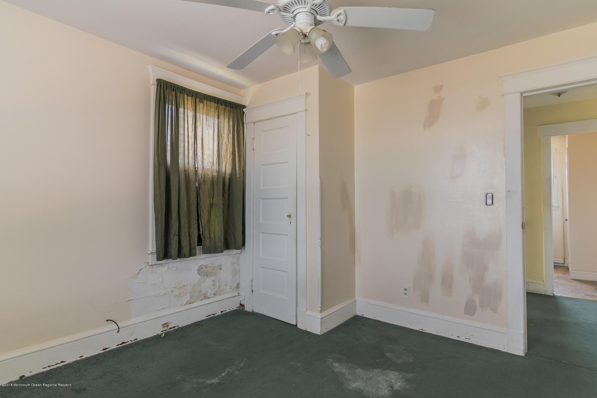 1723 River Road Belmar, NJ 07719 - Photo 24 of 29 an empty room with windows and fan