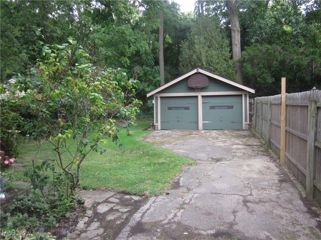 10035 Baltic Road Cleveland, OH 44102 - Photo 37 of 41 Garage featuring a yard