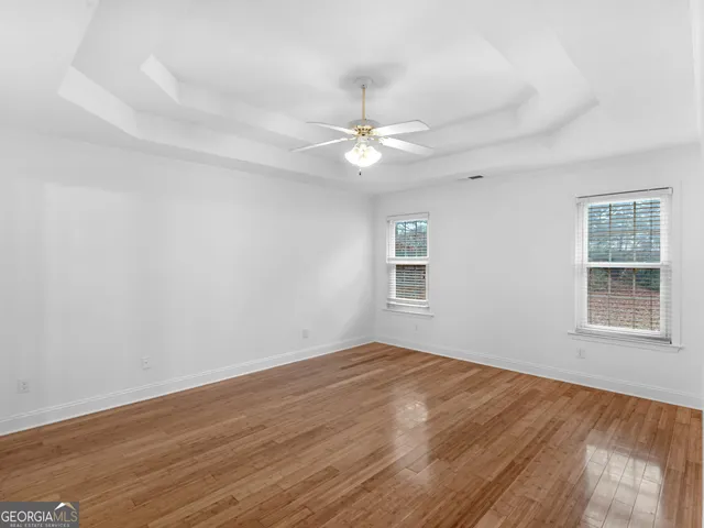 a bathroom with a sink double vanity and a mirror