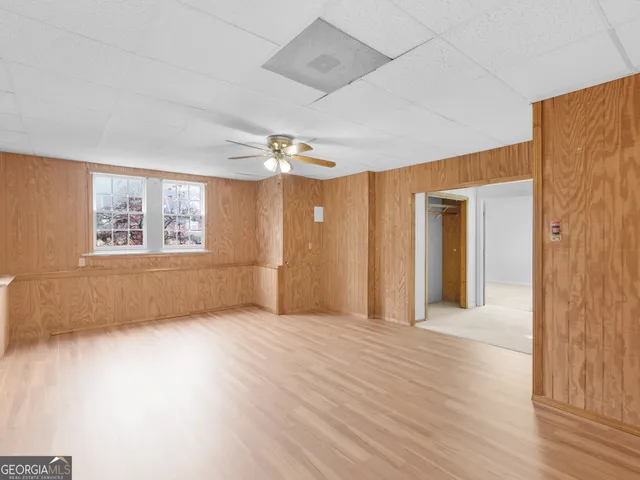 a view of an empty room and closet