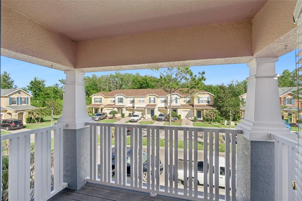 16178 Old Ash Loop Orlando, FL 32828 - Photo 11 of 24 a view of a street from a balcony