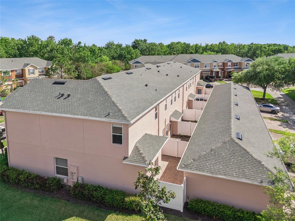 16178 Old Ash Loop Orlando, FL 32828 - Photo 21 of 24 an aerial view of a house with a yard