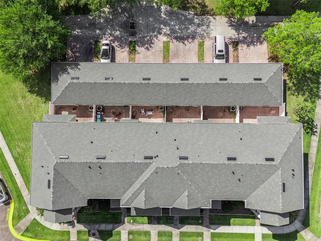 16178 Old Ash Loop Orlando, FL 32828 - Photo 22 of 24 an aerial view of a house with garden space and a swimming pool