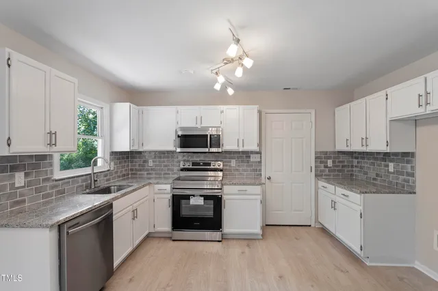 $219,800 | 4332 Falls Drive, Hope Mills, NC 28348