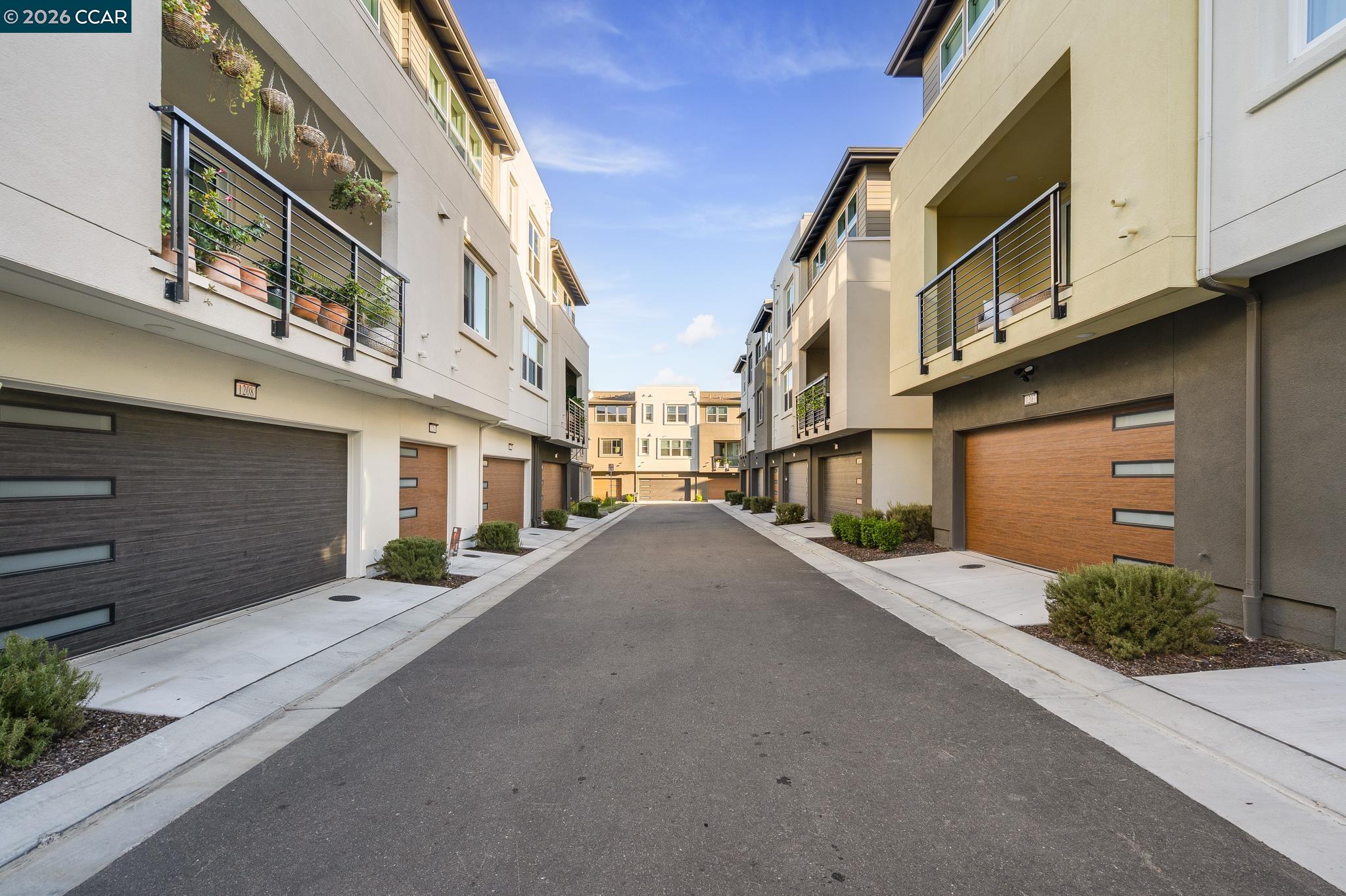 1200 Lorenzini Loop San Ramon, CA 94583 - Photo 23 of 35 a street view with tall buildings