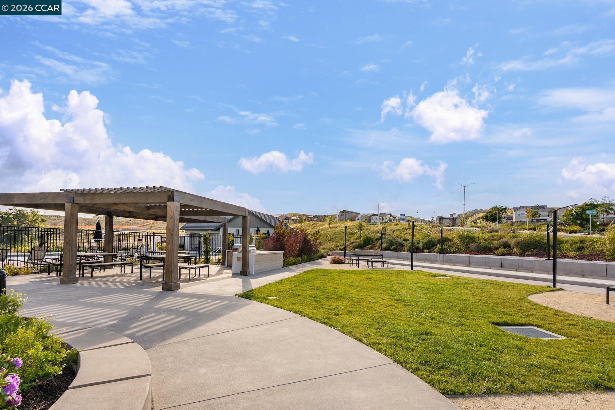 1200 Lorenzini Loop San Ramon, CA 94583 - Photo 30 of 35 a view of a swimming pool with an outdoor seating