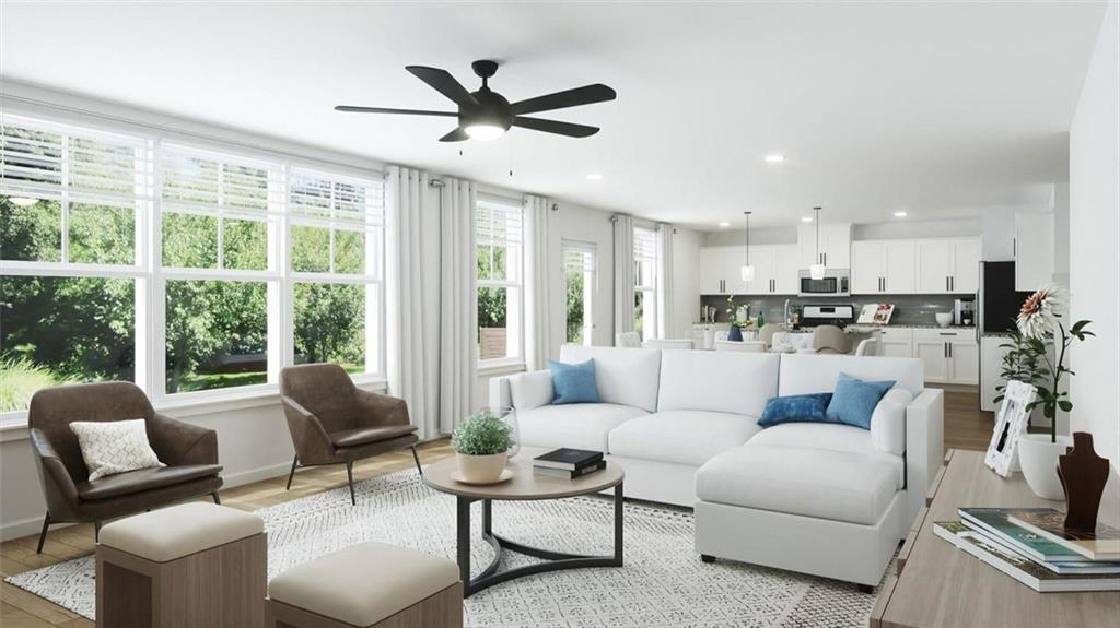 2309 Derrick Drive Grayson, GA 30017 - Photo 4 of 4 a living room with furniture and a large window